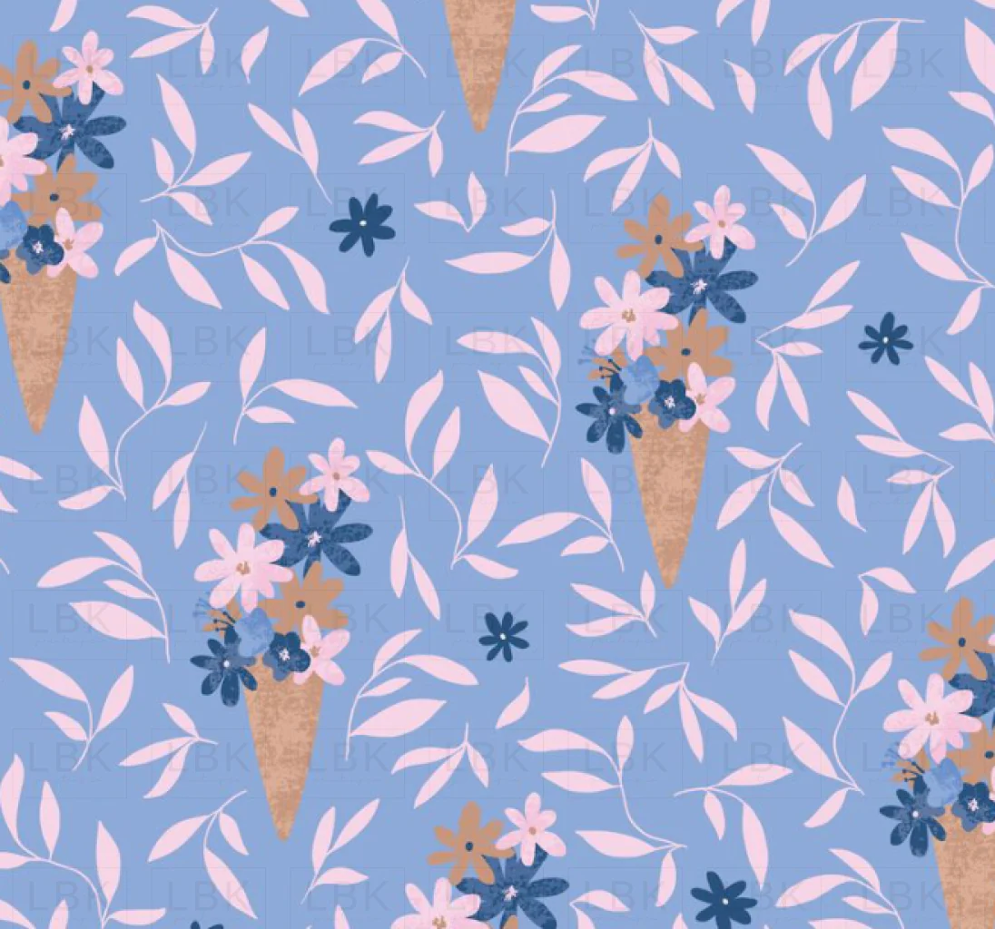 flowers in ice cream cone on light blue