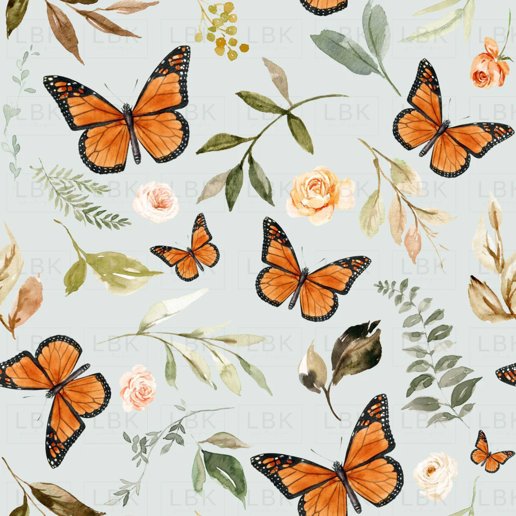 Monarch Butterflies on Pale Blue